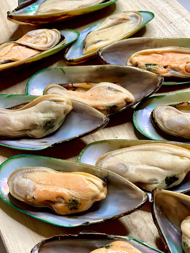 green mussels on the half shell