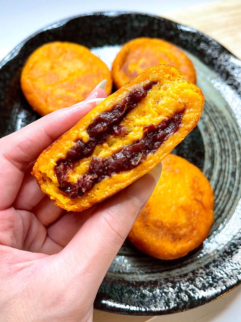 close up of sweet potato pancakes with red bean paste