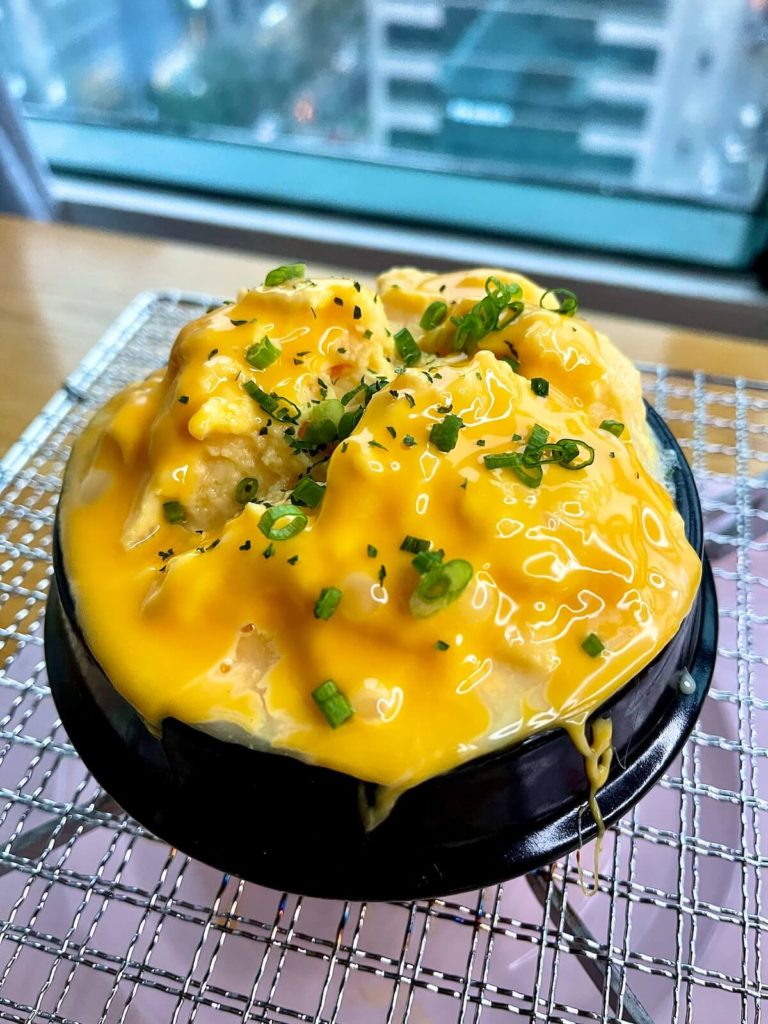 Korean steamed eggs topped with scallions and American cheese
