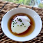 onsen egg in a white saucer