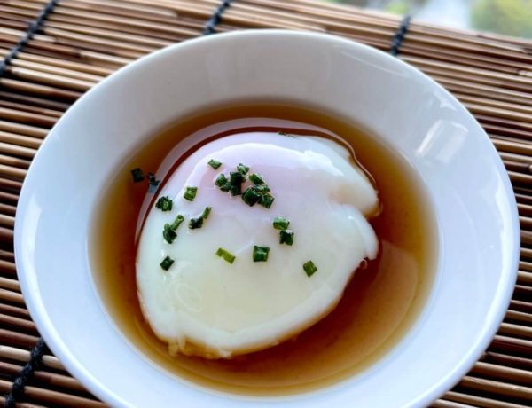 onsen egg in a white saucer